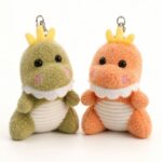 Crowned dinosaur plush keychain set front view