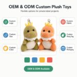 Crowned dinosaur plush keychain set embroidered detail