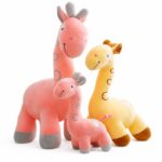 Pink yellow giraffe plush toy set front view